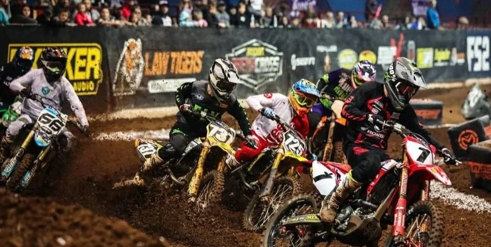 Four riders battle through a berm during the 2020 Kicker Arenacross 450 Pro Main.